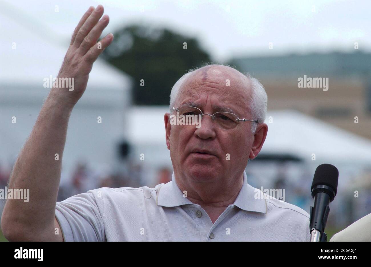 College Station, Texas USA, June 13, 2004:  Former Soviet President Mikhail Gorbachev speaks to the press before he gives flowers and vodka to former President George Bush on his parachute jump celebrating his 80th birthday.   ©Bob Daemmrich Stock Photo