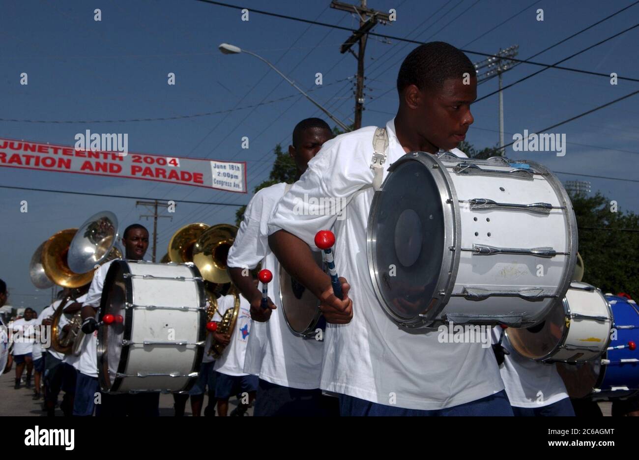 Austin Texas USA, June 19, 2004 Drummers march with their high school
