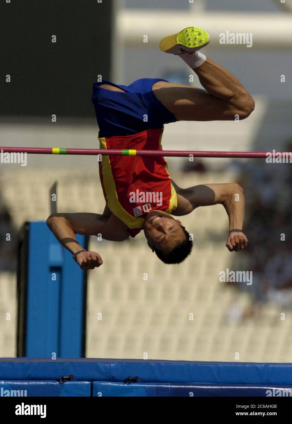 Athens, Greece , September 23 2004: China's Bin Hou wins the F42 men's high jump with a leap of 1.77 meters at the Athens Paralympics. ©Bob Daemmrich Stock Photo