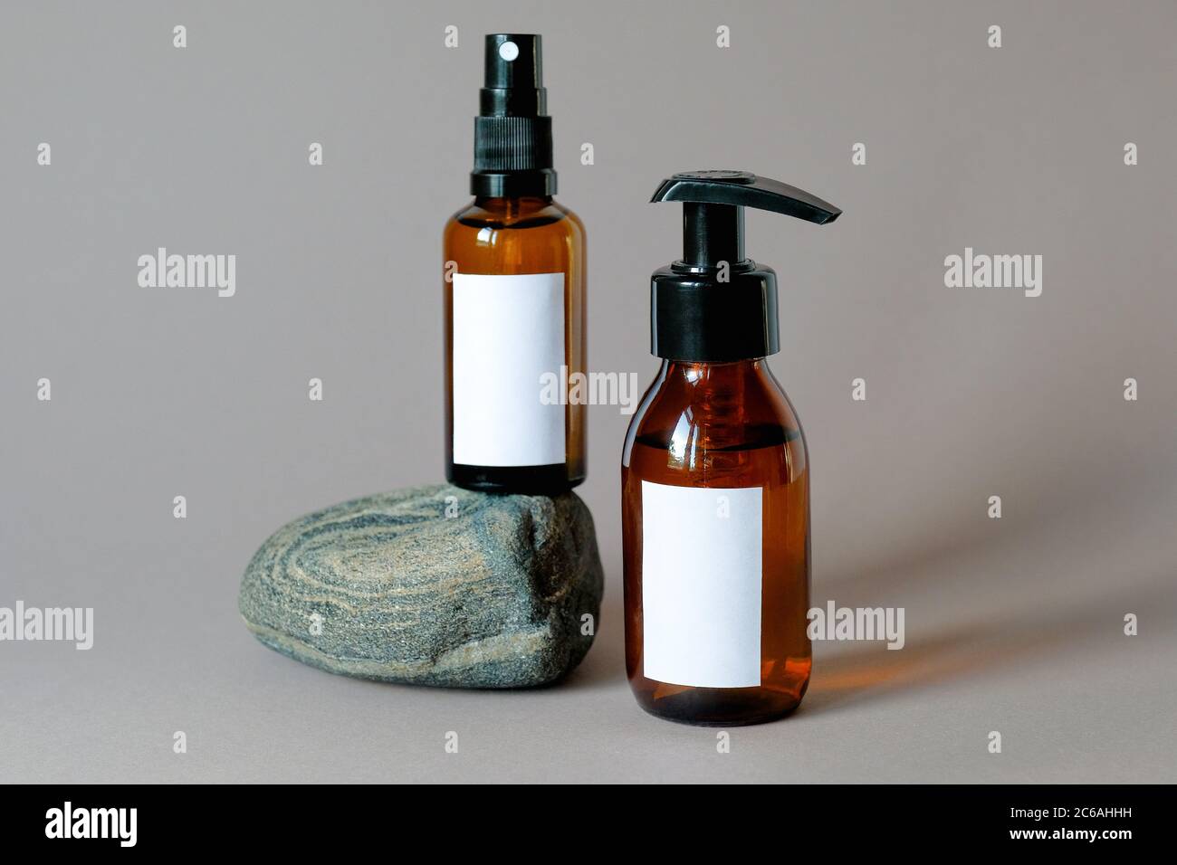 Download Cosmetic Dark Amber Glass Bottles Set With Blank Labels Natural Organic Bathroom Soap And Body Spray On Stone Beauty Product Packaging Design Stock Photo Alamy