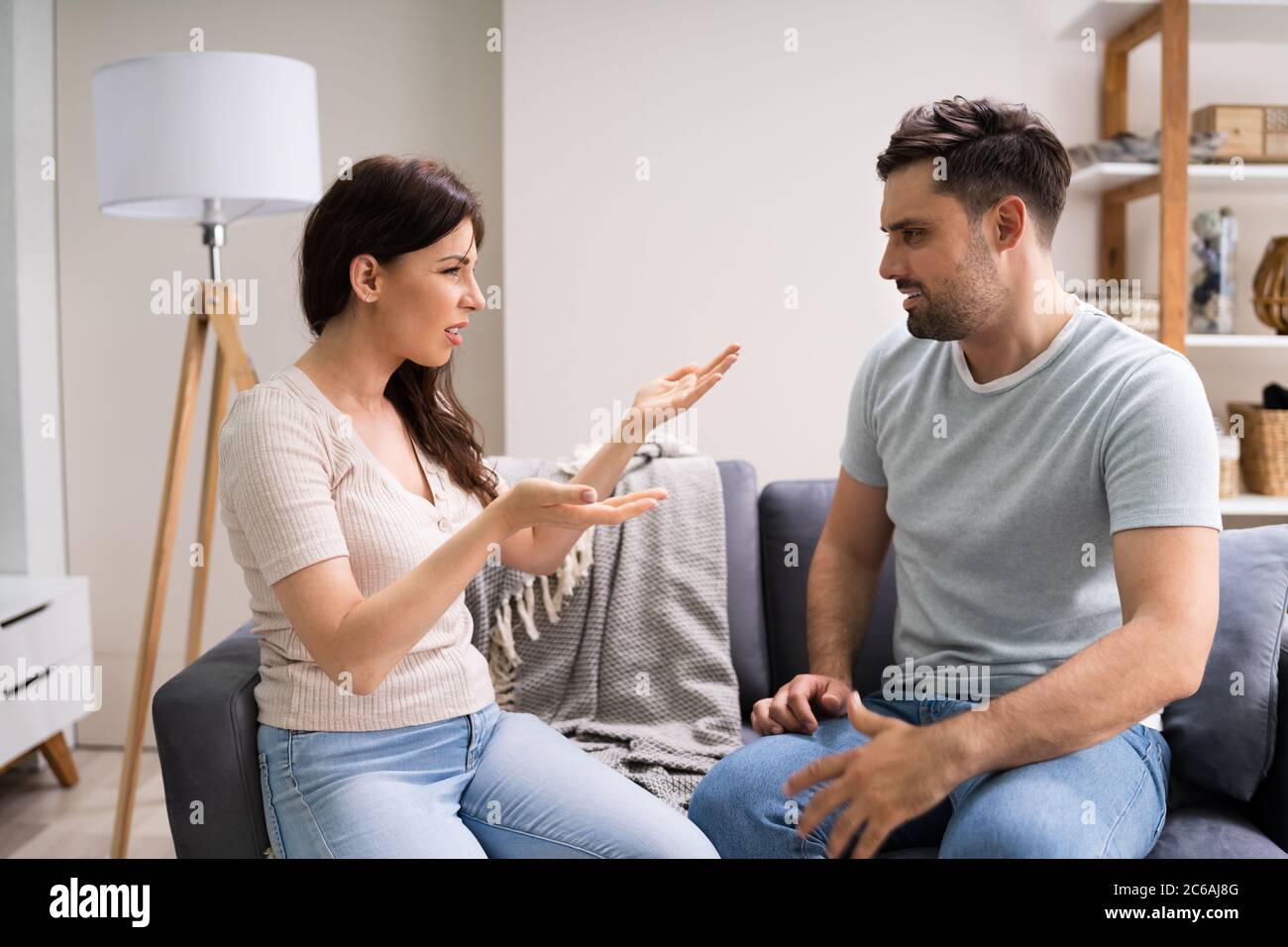 Sad Couple Infidelity Problems. Woman Dispute And Arguing Stock Photo