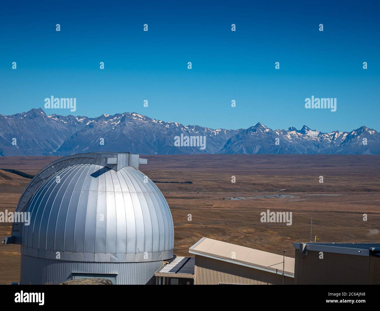 Aerial view with the observatory from the top of Mount John in Lake Tekapo of New Zealand. Stock Photo