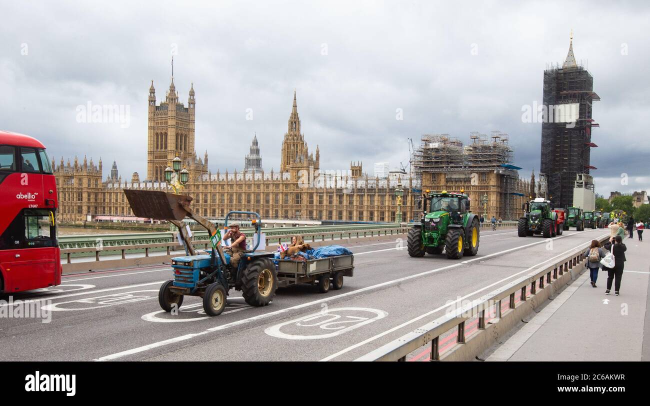 London, UK. 8th July, 2020. Save Britsh Farming demonstration. 12 Tractors driving around Westminster to urge the Government to protect British jobs. They are afraid of deals with the USA that would allow chlorinated chicken and hormone produced beef to be imported to the UK. Credit: Tommy London/Alamy Live News Stock Photo