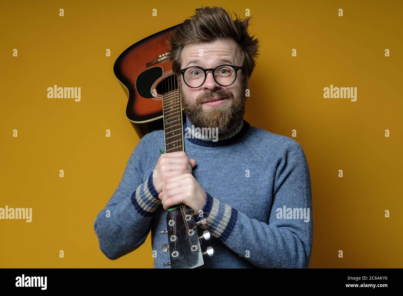 Rock and Roll Man with Guitar on Shoulder Embracing Woman Stock Image -  Image of leather, hold: 99189689