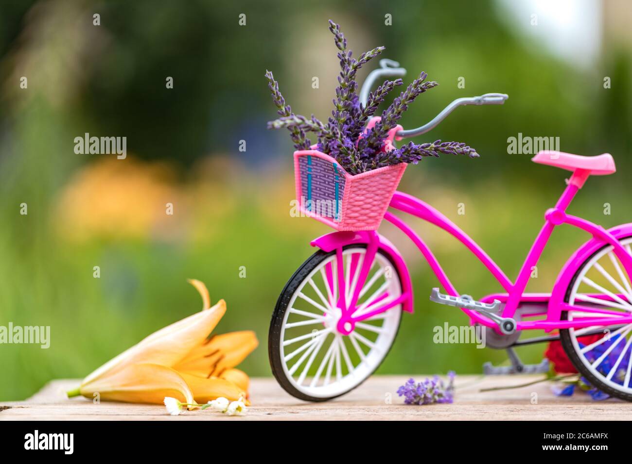Download Vintage Bicycle With Flowers Summer Background With Toned Picture Vintage Pink Bicycle With Flower Basket Stock Photo Alamy