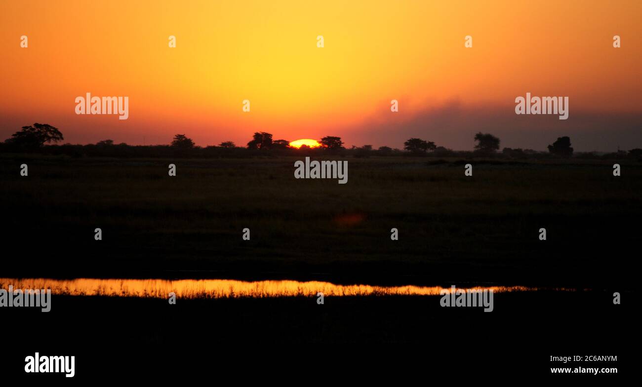 Sunset Ihaha Campsite, Chobe National Park, Botswana Stock Photo - Alamy