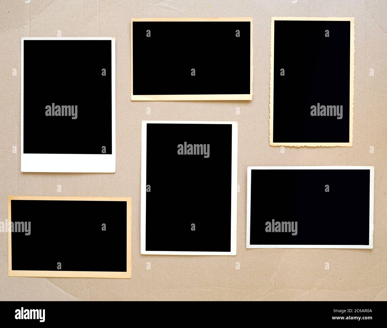 old empty photo frames, vintage photo prints on cardboard with free