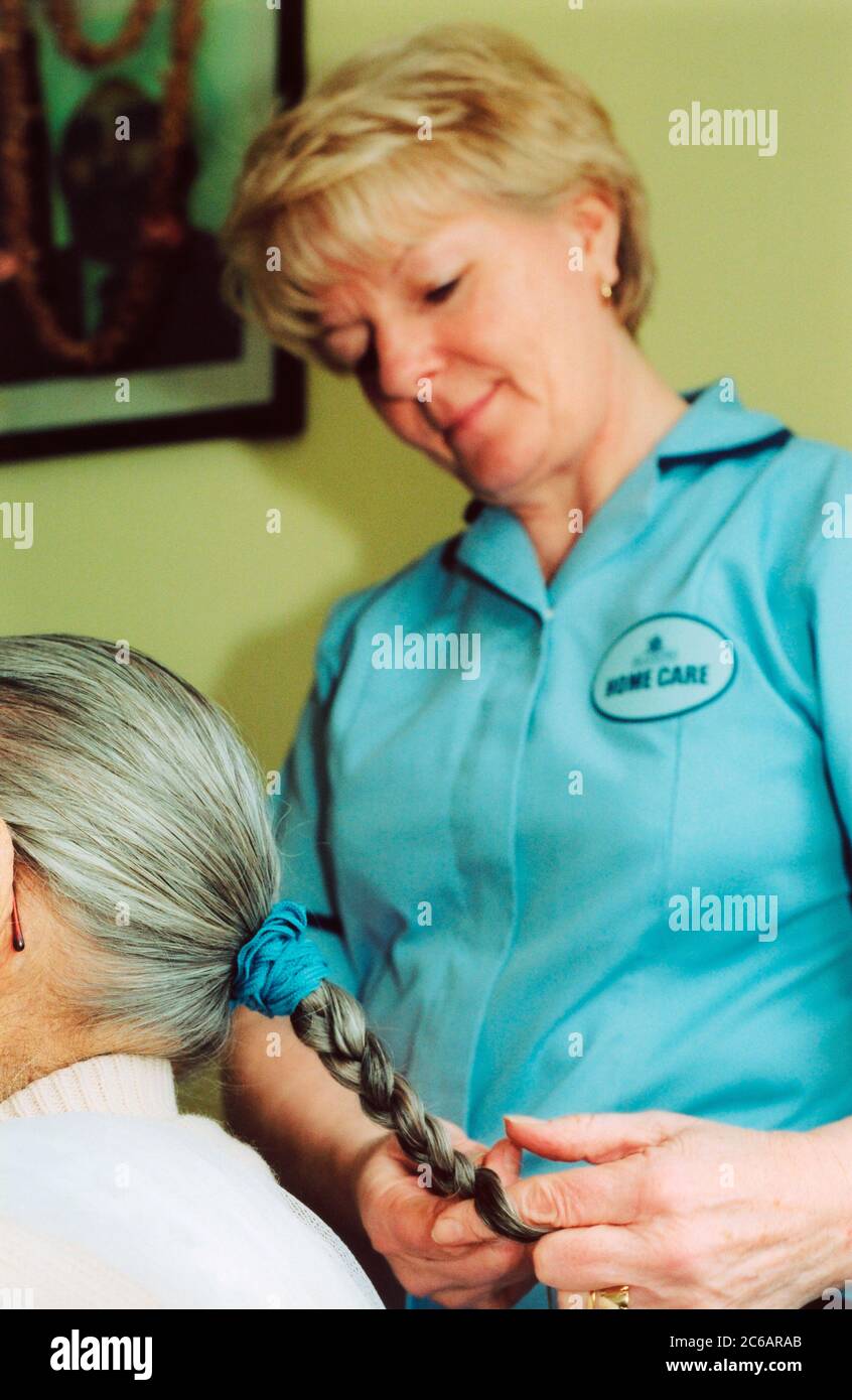 Carer in an old peoples home hi-res stock photography and images - Alamy