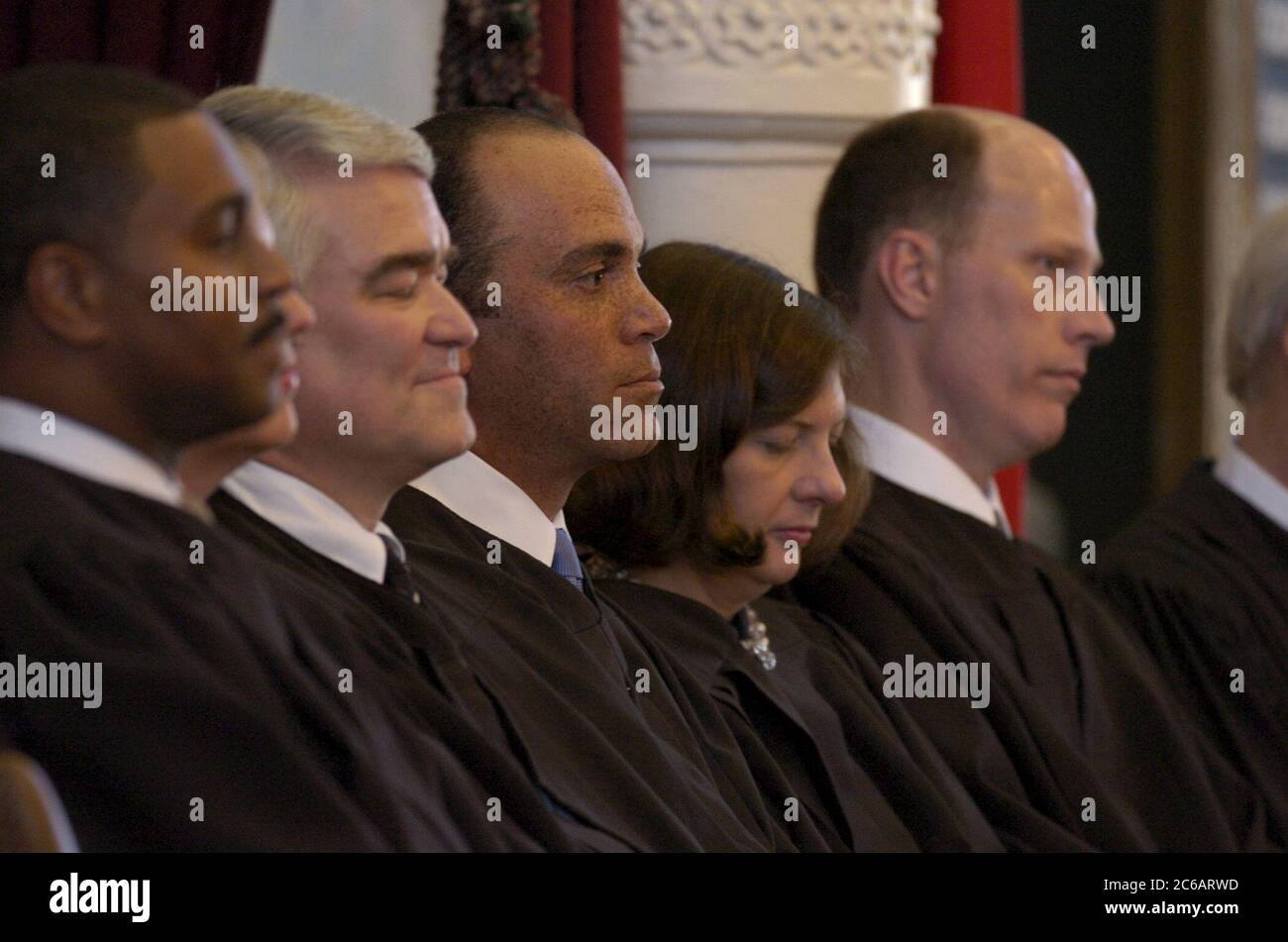 Male and female state supreme court justices hires stock photography