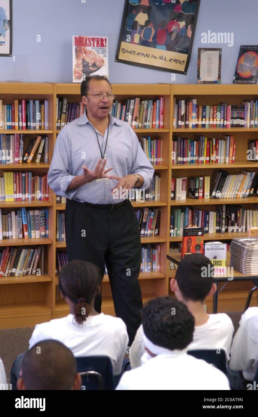 Austin, Texas USA  November, 2004: Teen author Walter Dean Meyers, author of young adult fiction, speaks to classes at the Alternative Learning Center for teens who can't get along in regular classes attend.  ©Bob Daemmrich Stock Photo