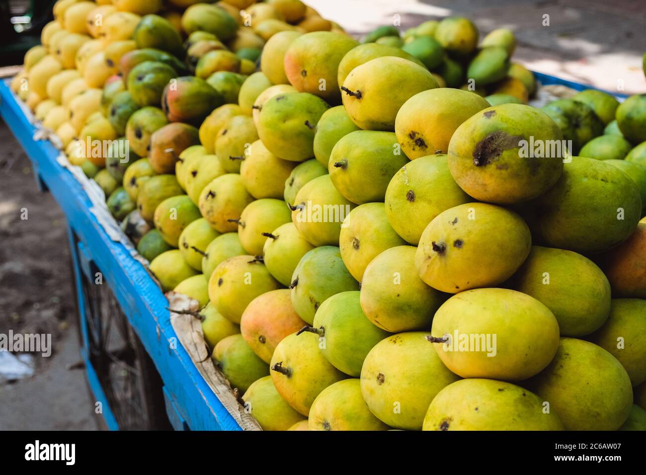 Mangoes are sold in street markets Stock Photo Alamy