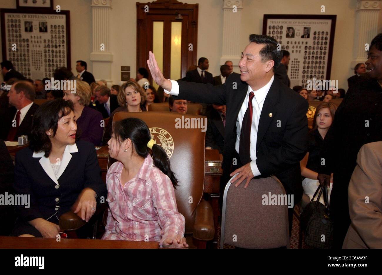 Hubert Vo, the first Vietnamese-American elected to the Texas legislature, with his wife and daughter on opening day of his first legislative session at the Texas Capitol in January 2005. Stock Photo