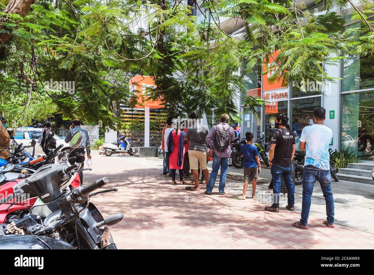 Bangalore, India - May 31, 2020. Citizens stand in line to shop during a pandemic. Bangalore India Stock Photo