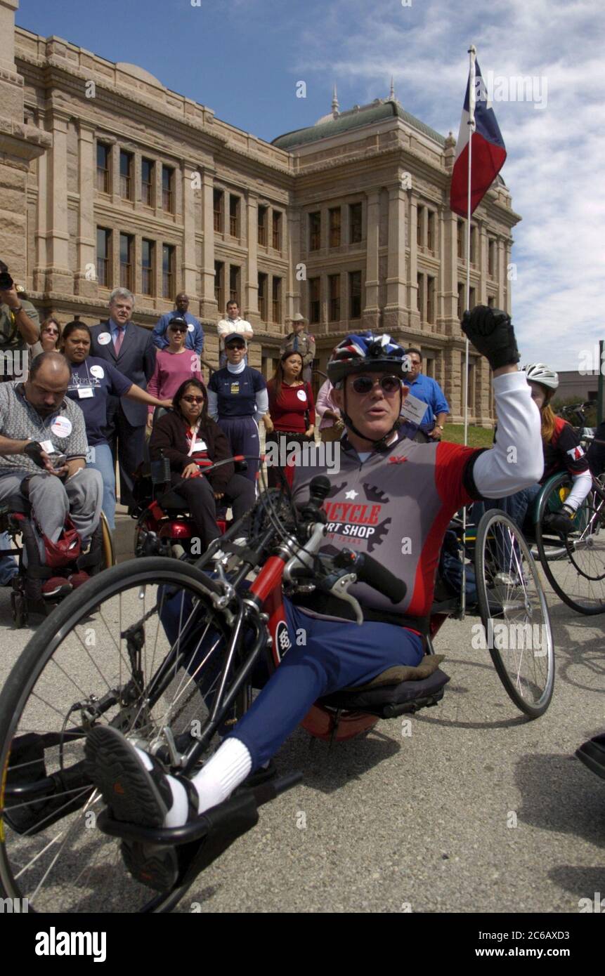 Austin, Texas USA, March 8 2005: Disability rights rally at the Texas Capitol featuring arrival of Mikail Davenport, who had polio as a child. He cycled 350 miles from south Texas to the Capitol in support of disability rights. ©Bob Daemmrich Stock Photo