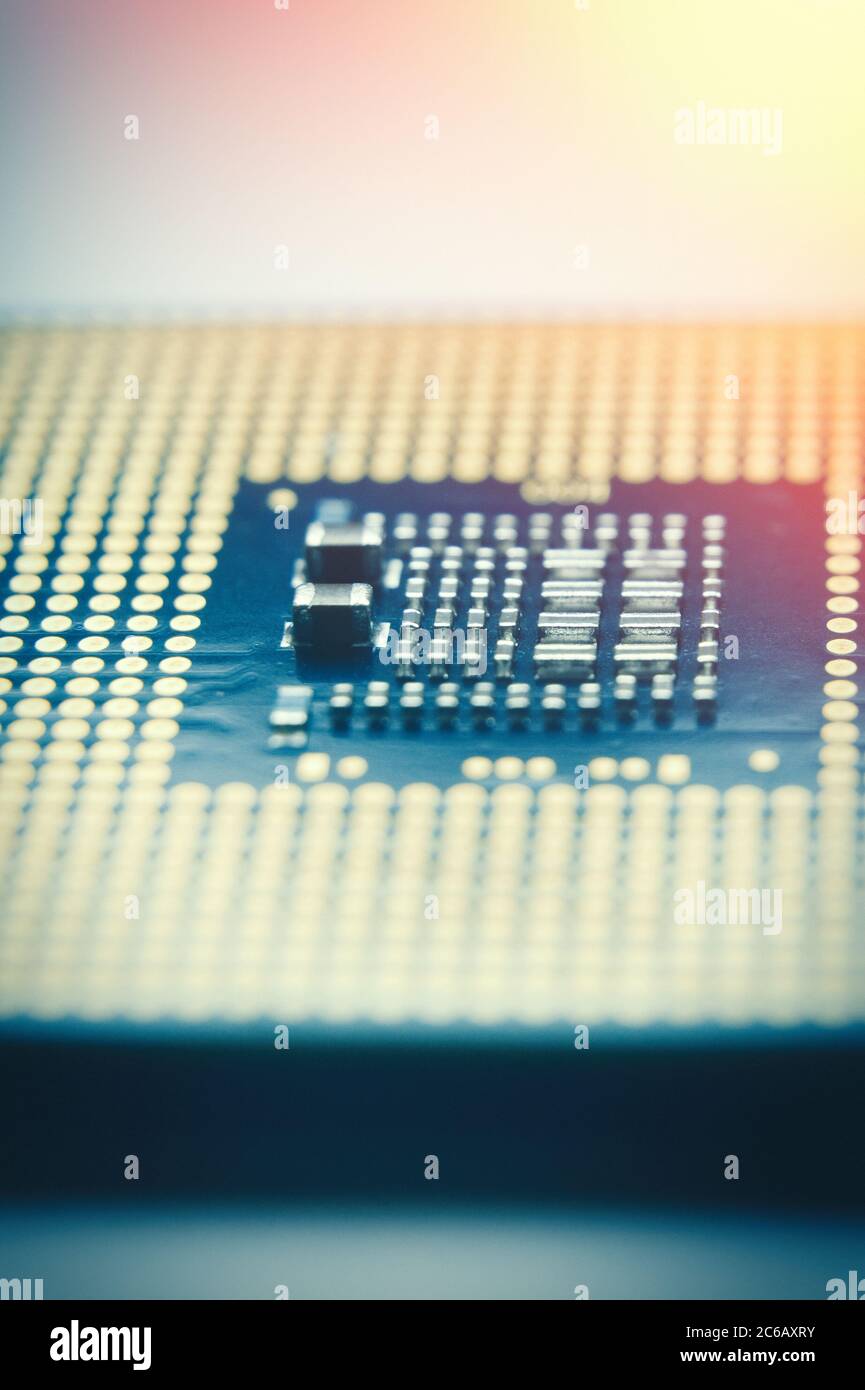 Close-up CPU - Central processing unit microchi. Selective focus and lens flare, toned photo. Stock Photo