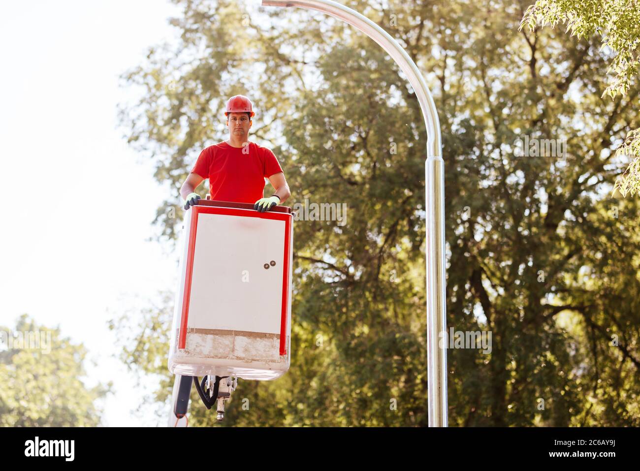 Man Riding Signal Rig Floor Man climbing a traffic light hi-res stock photography and images - Alamy