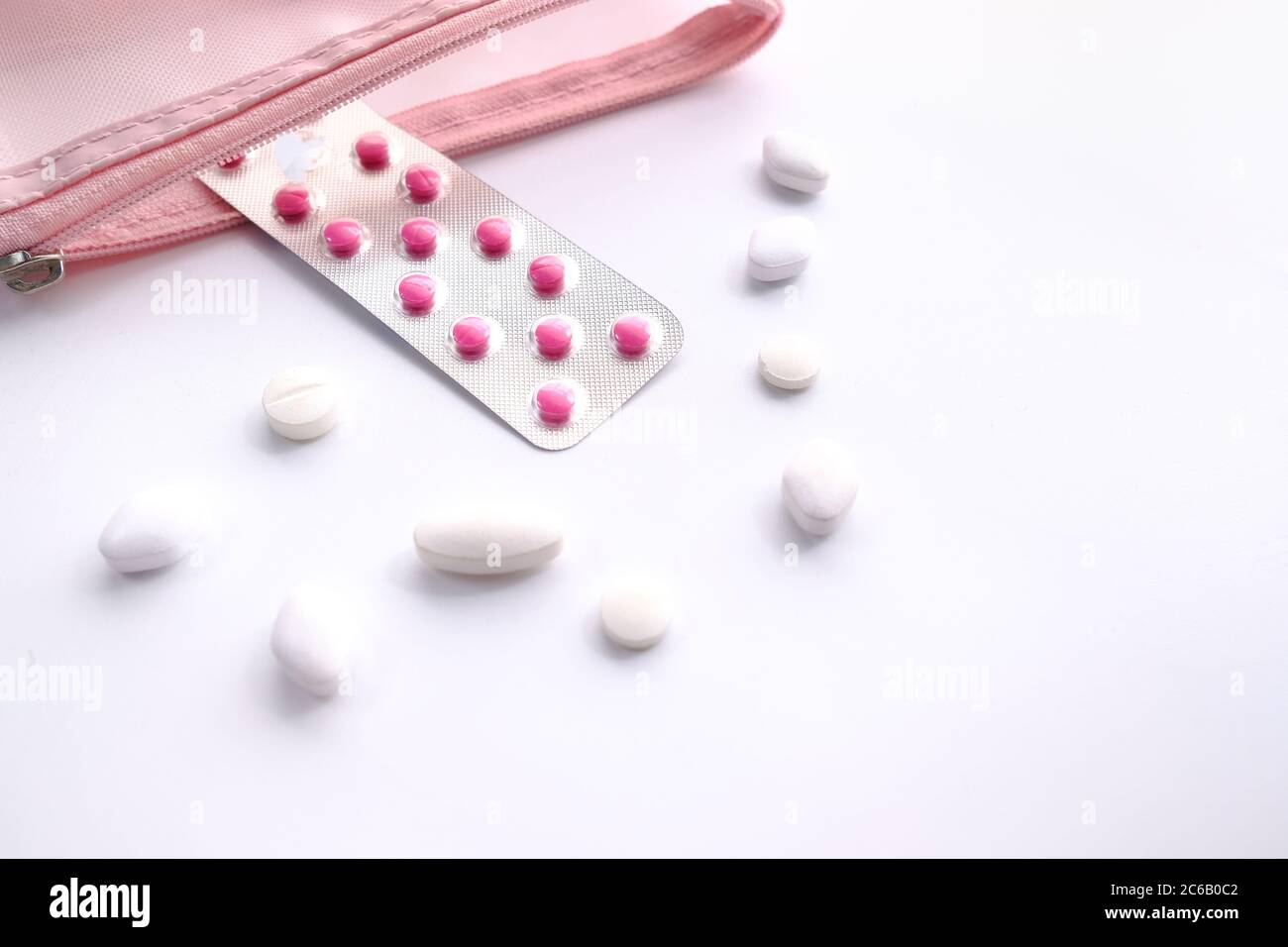 white pills and blister pack on white background  Stock Photo