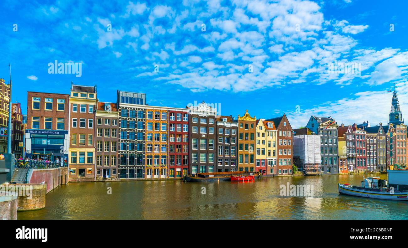 Amsterdam, August 5 2019: The backside of the houses of the Warmou straat at the Damrak in Amsterdam Stock Photo