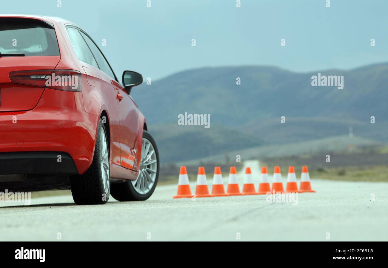 sports car on a test track with cones Stock Photo