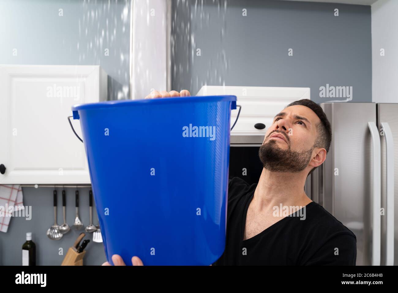 Leak bucket hires stock photography and images Alamy