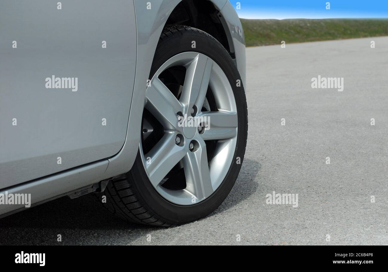 tire and alloy wheel on passenger car Stock Photo Alamy