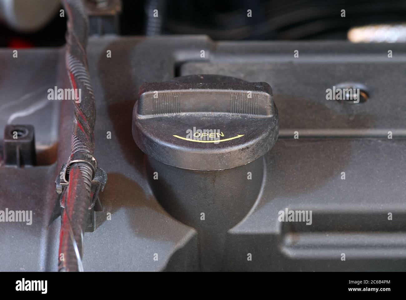 Engine oil cap on a motor vehicle Stock Photo Alamy