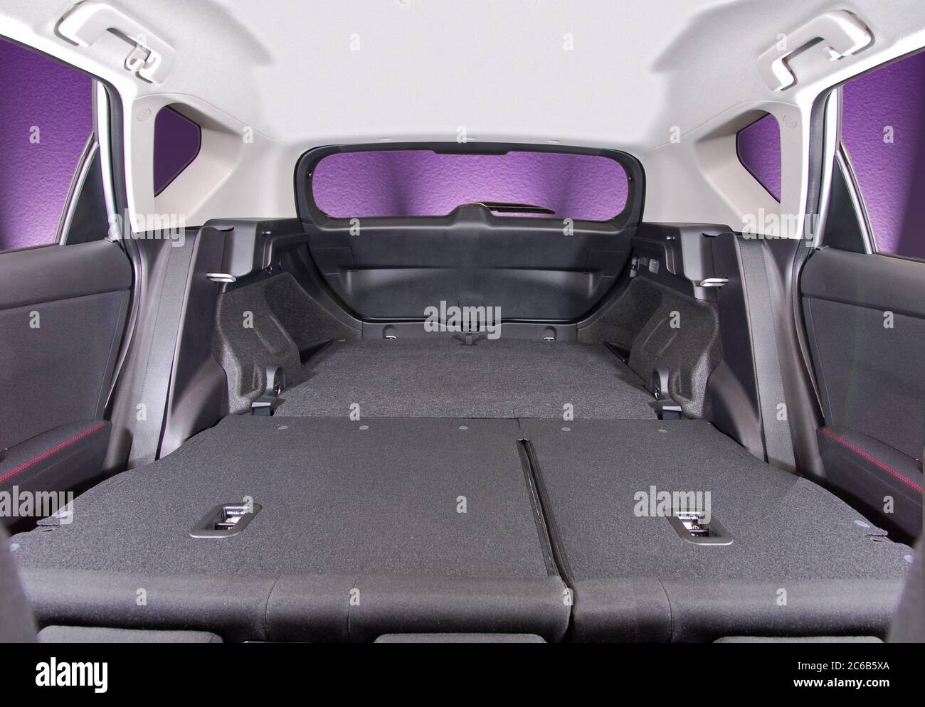 car trunk with rear seats folded Stock Photo