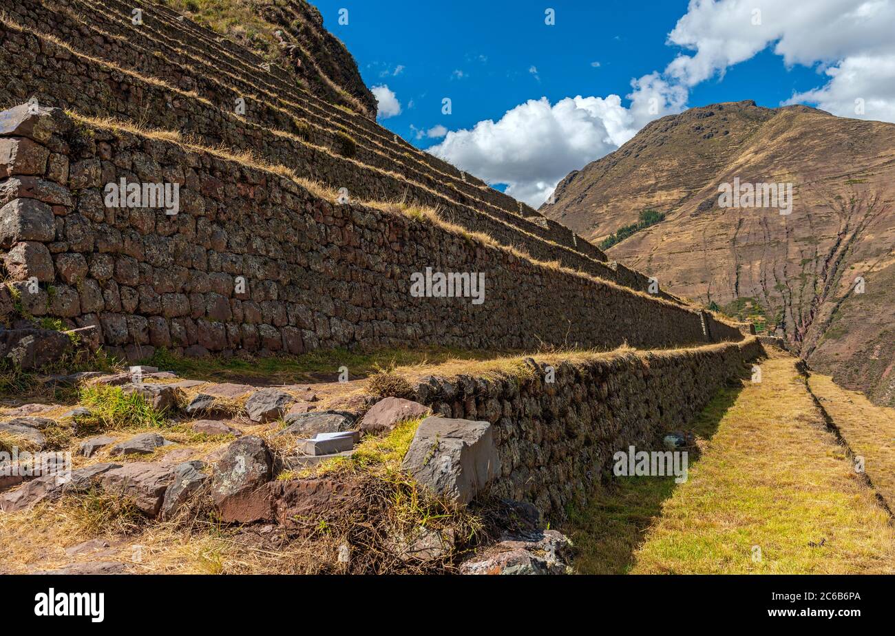 Inca walls and agriculture terraces in the ruin of Pisac, Sacred Valley, Cusco, Peru. Stock Photo