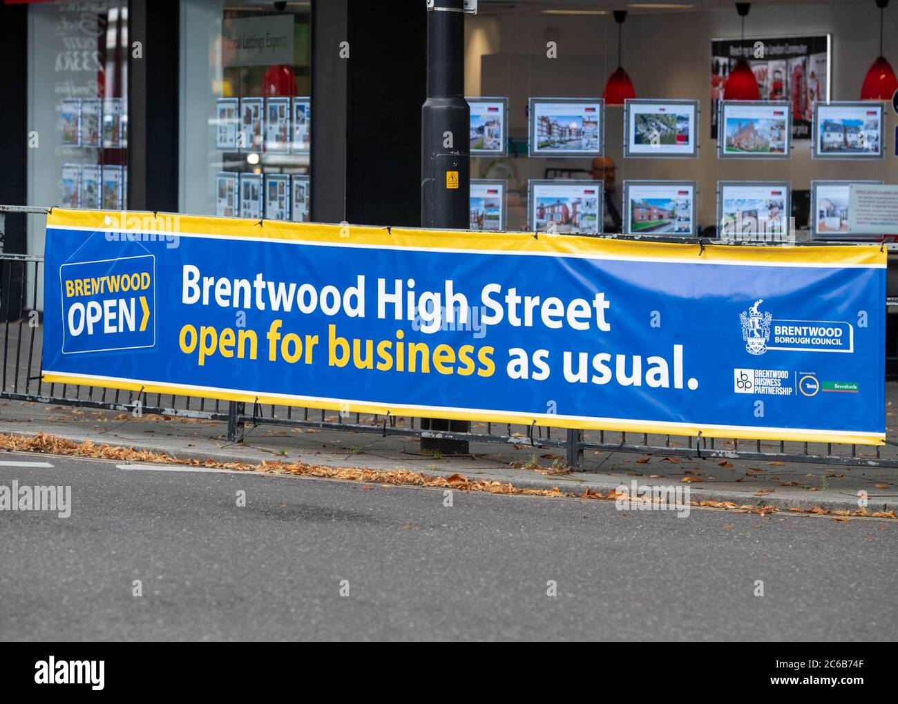 Brentwood High Street open for business as usual sign Stock Photo