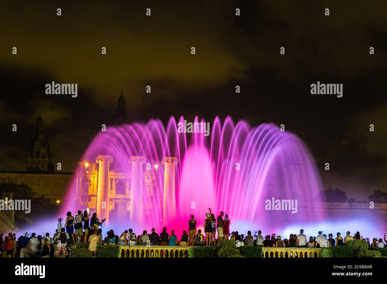 Magic Fountain light show at night next to National museum in Barcelona
