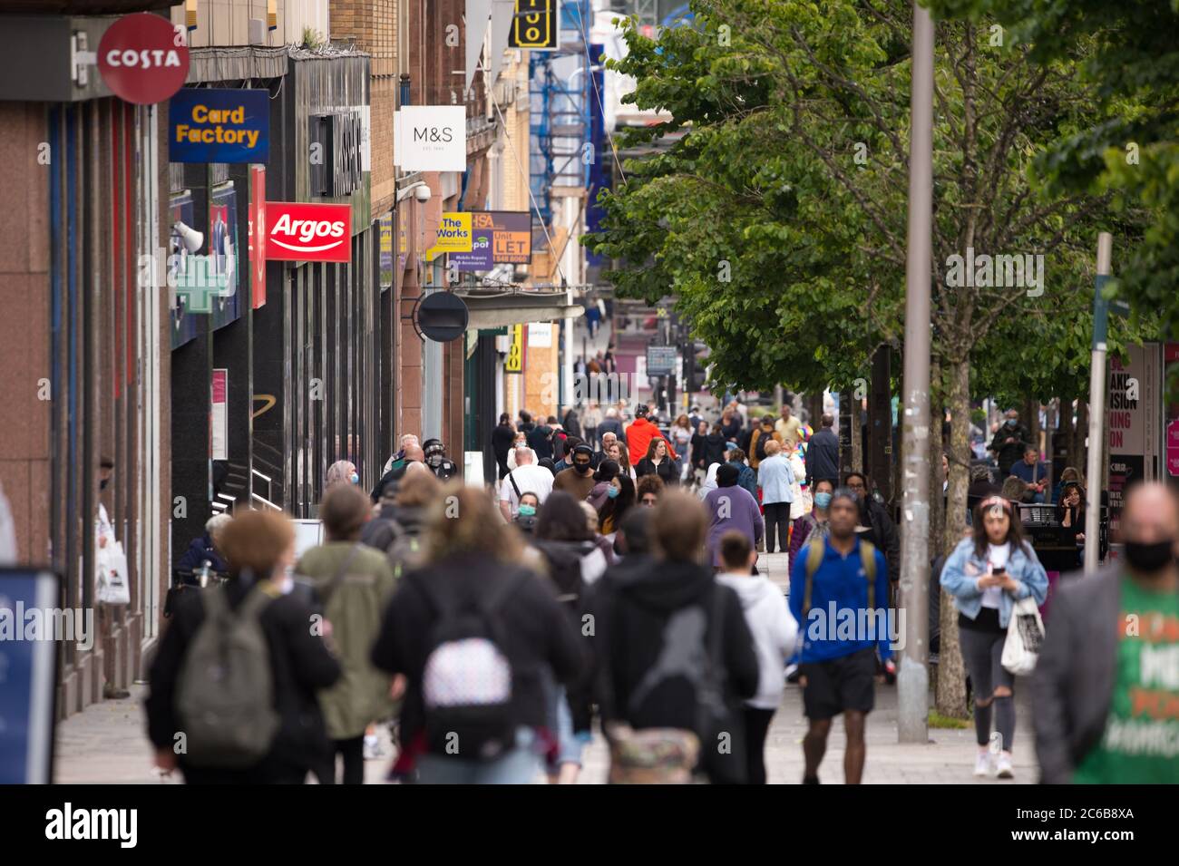 Glasgow, Scotland, UK. 8th July, 2020. Pictured: People out shopping in Glasgow City Centre as the coronavirus (COVID19) lockdown has eased, and from this Friday 10th July, people will be required to wear a face covering when going into a shop in a bid to stop the spread of the coronavirus. Credit: Colin Fisher/Alamy Live News Stock Photo