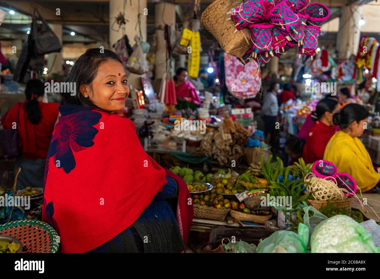 Woman vendor selling colourful dolls, Ima Keithel women's market, Imphal, Manipur, India, Asia Stock Photo