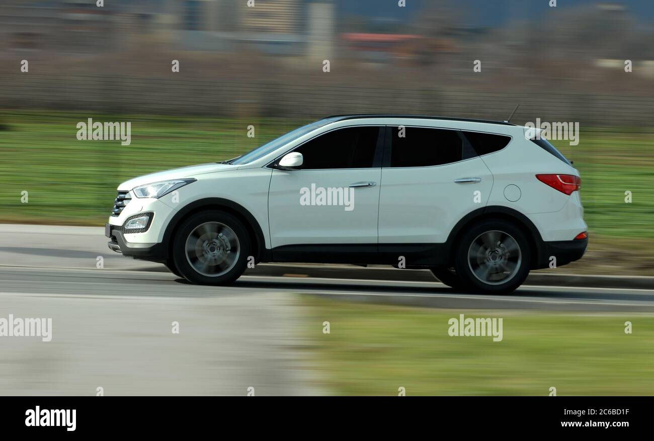 The Suv Is Moving At High Speed Stock Photo Alamy