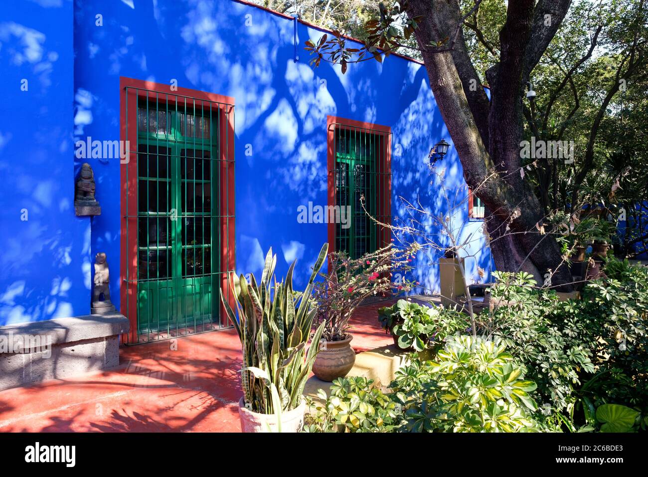 Colorful courtyard at the Frida Kahlo Museum known as the Blue House  at Coyoacan in Mexico City Stock Photo