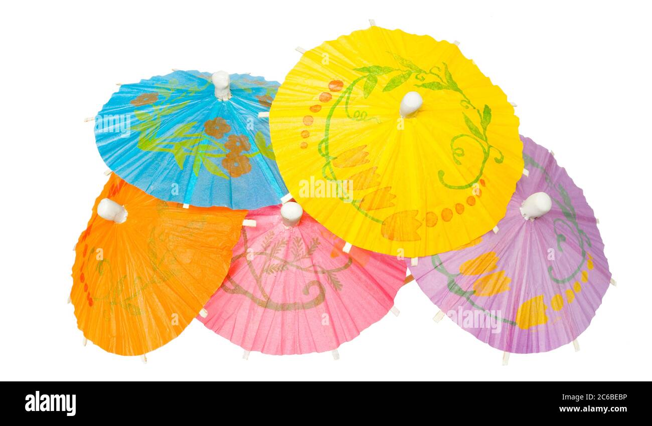 Multicolored Cocktail Umbrellas, spring and summer symbol,isolated on white background Stock Photo