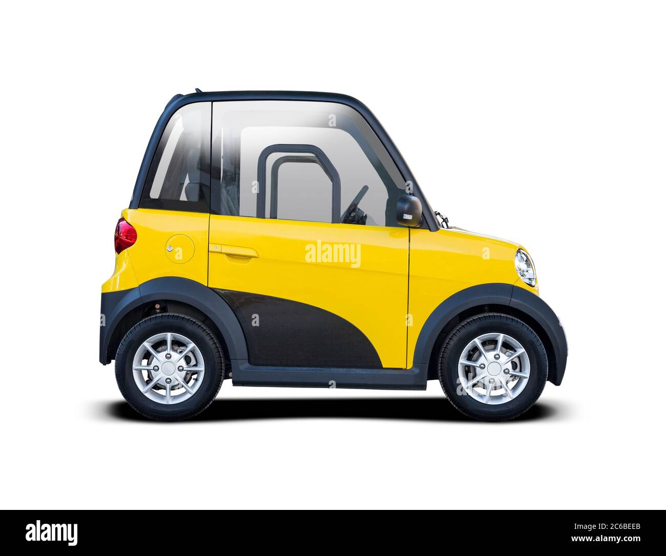 Yellow electrical city car side view isolated on white Stock Photo