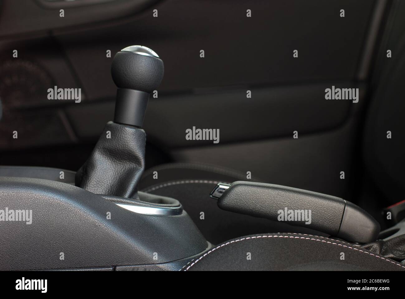 manual gear shift handle and handbrake Stock Photo Alamy