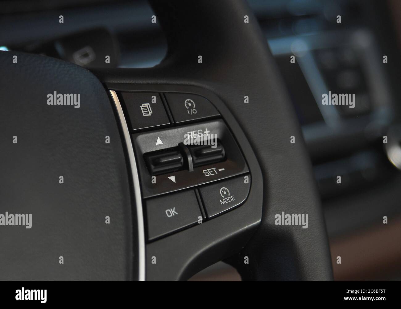 Cruise control button, cruise control button on the steering wheel