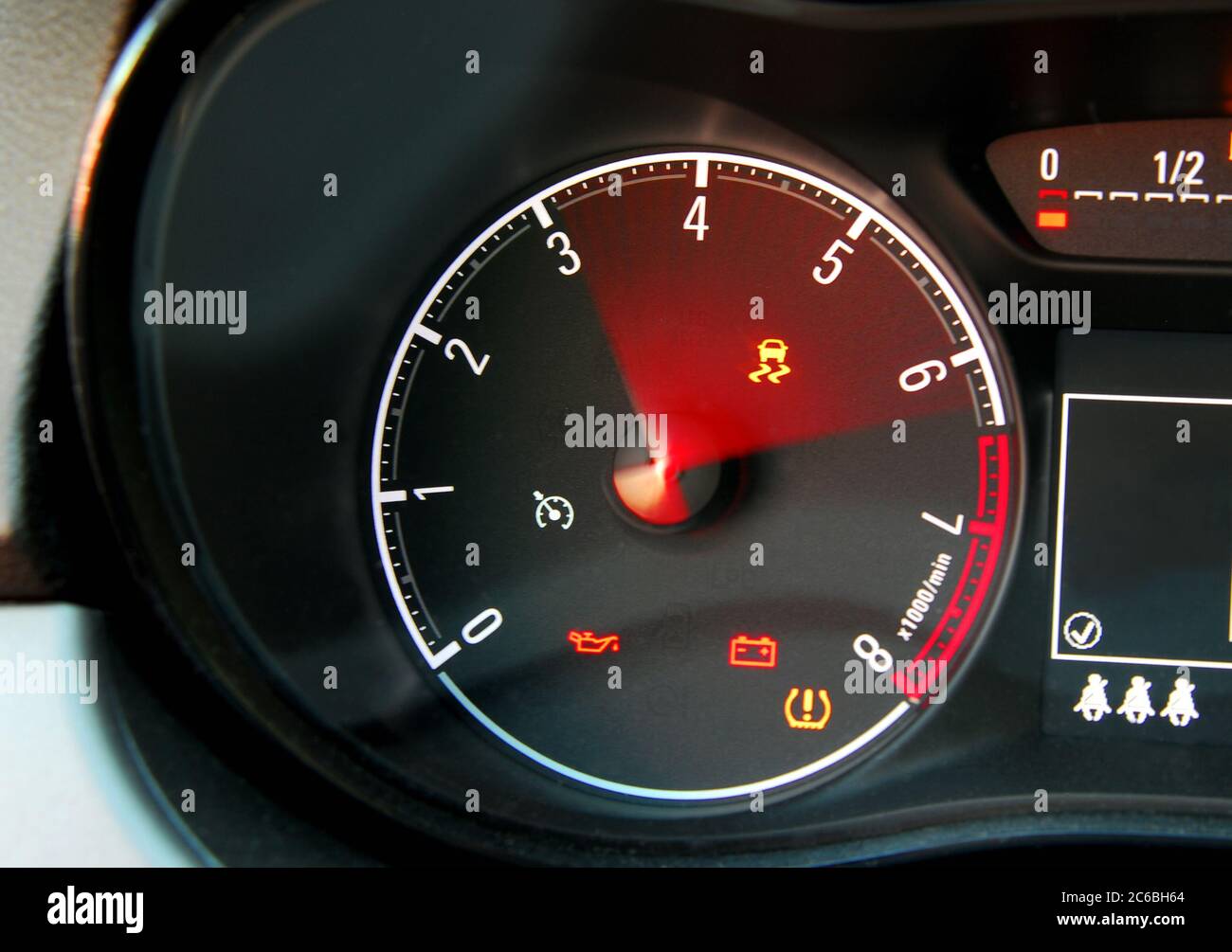 Car Tachometer, Tachometer reaching the red zone, sports car inside