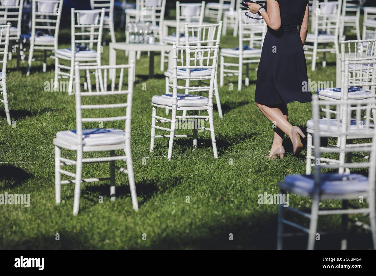 Distance between chairs at a garden event for social distancing during the Covid-19 outbreak. Stock Photo