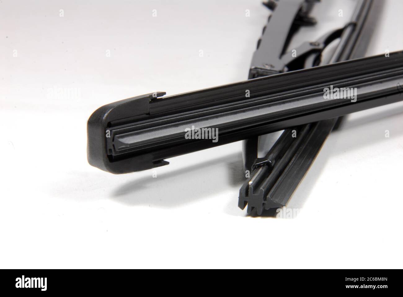 detail of automotive windshield wipers new and old style Stock Photo