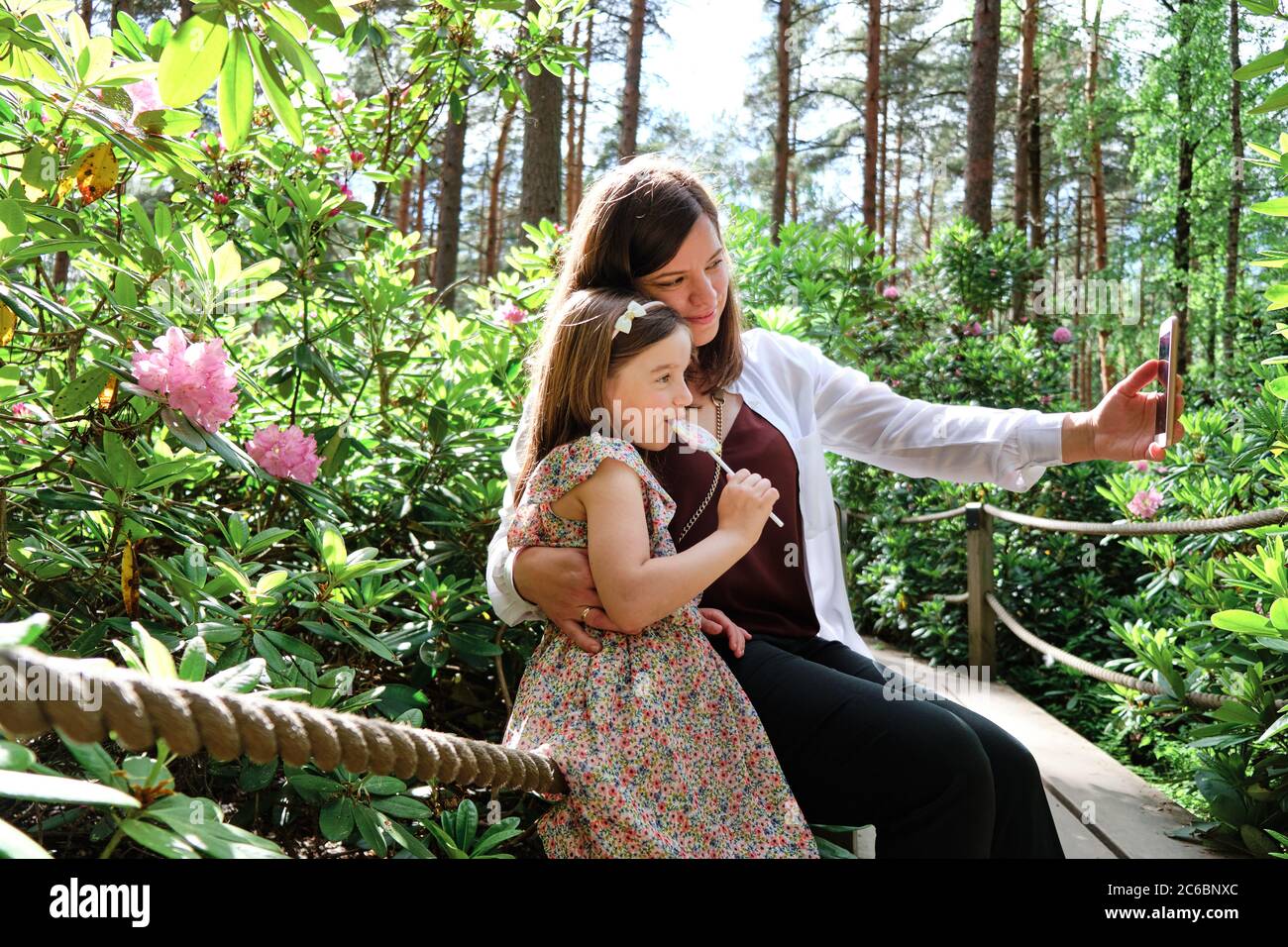 Mother And Her Daughter Take A Selfie In Rhododendrons Park It Is One Of The Most Popular And Beautiful Places In Helsinki Finland Stock Photo Alamy