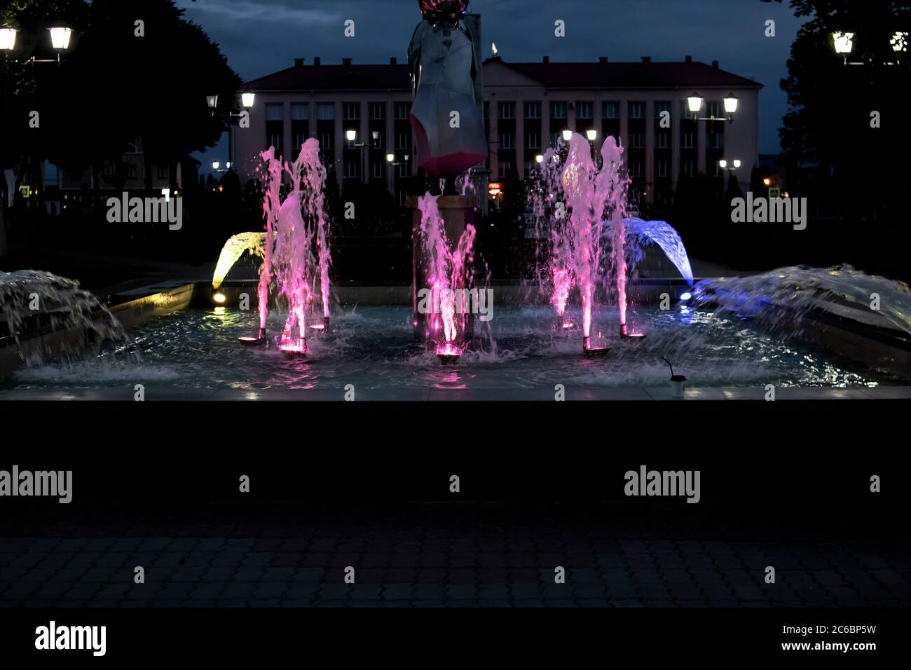 Colored lighting in the fountain at night Stock Photo - Alamy