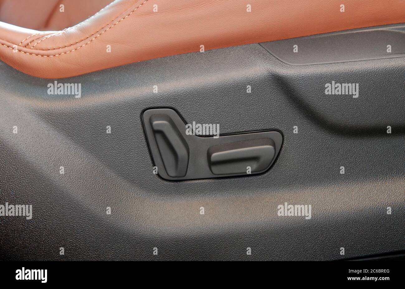 Buttons for adjusting seat position. Car interior detail Stock Photo