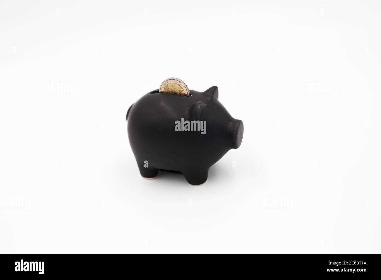 Black piggy bank on a white background Stock Photo - Alamy