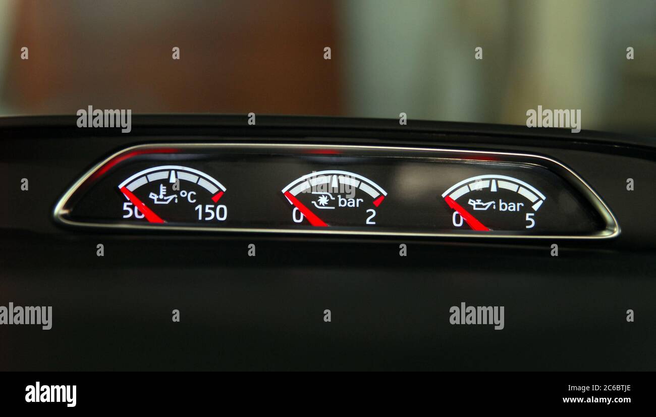 Instrument panel of the car. Analog instruments for temperature