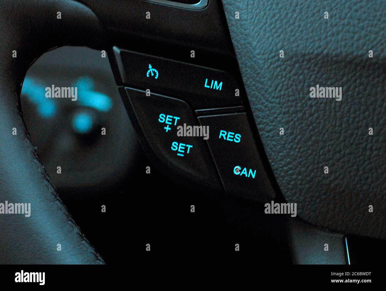 Cruise control button on the steering wheel Stock Photo Alamy