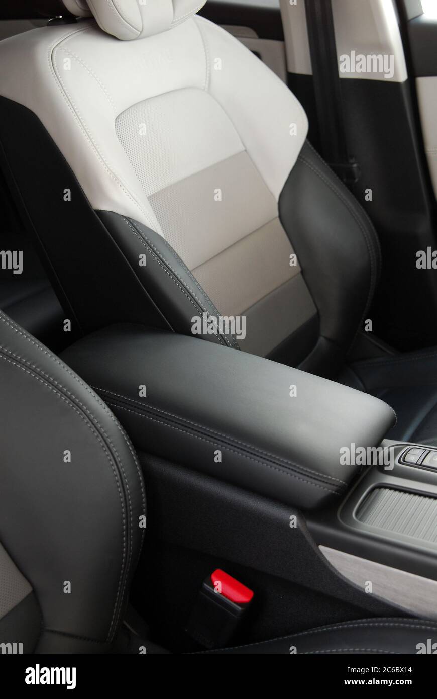Armrest in the luxury passenger car, rear seats Stock Photo Alamy