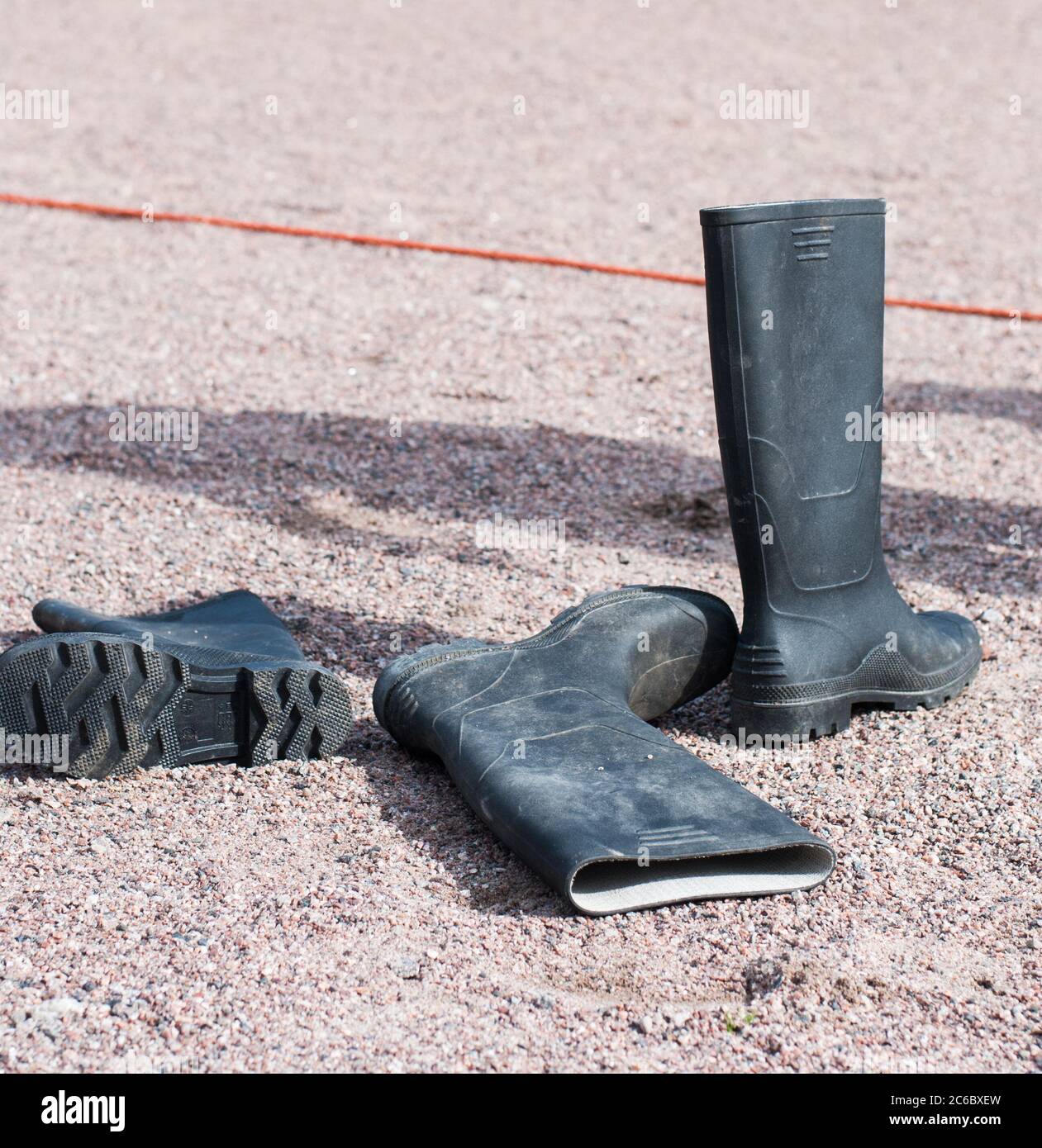 Throwing rubber boots, a traditional sport in Finland Stock Photo - Alamy