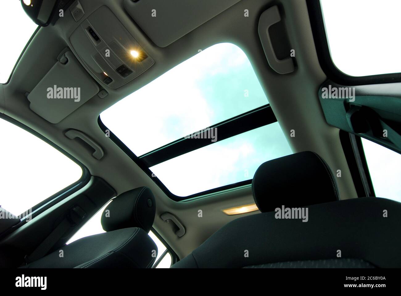 Panoramic double sunroof in a passenger car Stock Photo Alamy